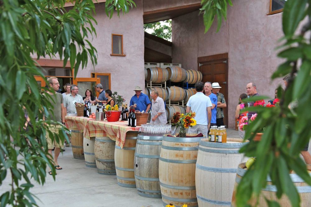 Visitors enjoying a winery tasting event in the Similkameen Valley, British Columbia