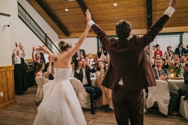 Manning Park Resort - Justine Russo Photography bride and groom at reception with guests.
